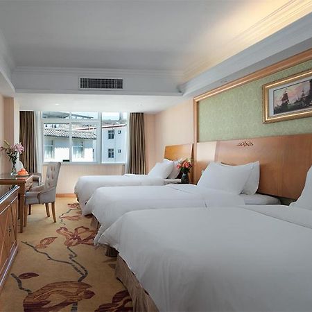 Vienna International Hotel Lijiang Yuxue Avenue Екстер'єр фото