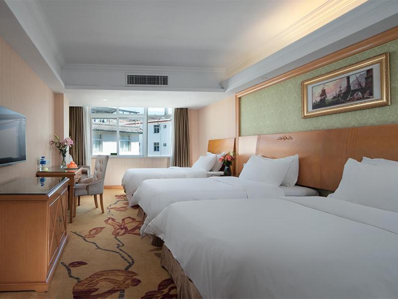 Vienna International Hotel Lijiang Yuxue Avenue Екстер'єр фото