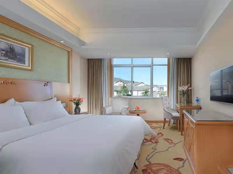 Vienna International Hotel Lijiang Yuxue Avenue Екстер'єр фото